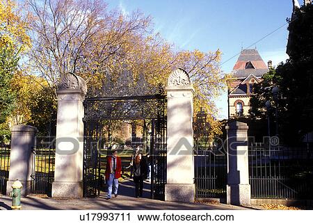 Stock Image -  university, Ivy League, Providence, Rhode Island, RI, Wrought-iron entrance gate to Brown University in Providence in the fall.. Fotosearch