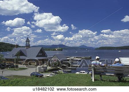 Vermont, VT, boat house, marina, Lake Memphremagog, Newport. Men sitting on a bench. View Large Photo Image Stock Image - Vermont, VT, boat house, marina, Lake Memphremagog, Newport. Men sitting on a bench.. Fotosearch
