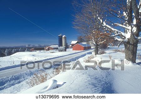 Stock Photography -  Vermont, VT, Farm with red barn along a snow-covered country road in South Albany in the winter . Fotosearch