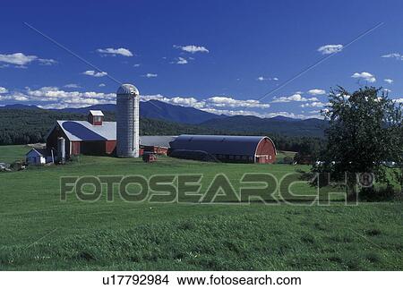 Picture -  Vermont, VT, Red barn at Tinker Farm and view of Mt. Mansfield in Fletcher . Fotosearch