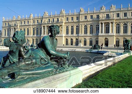 Picture -  Versailles, France, palace, Ile de France, Yvelines, Paris, Europe, Statue by the pool in the gardens at Chateau de Versailles.. Fotosearch