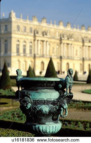 Stock Photograph -  Versailles, France, Paris, Ile de France, Yvelines, Europe, Ornate flower pot in the gardens at Chateau de Versailles.. Fotosearch