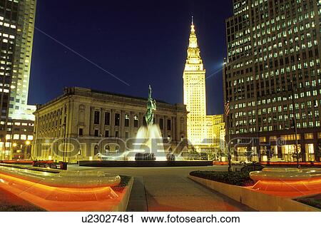 Stock Image -  Victory Fountain, Cleveland, OH, Ohio, Victory Fountain in front of the South Mall of the Terminal Tower at night, a Beaux-Arts skyscraper. Fotosearch