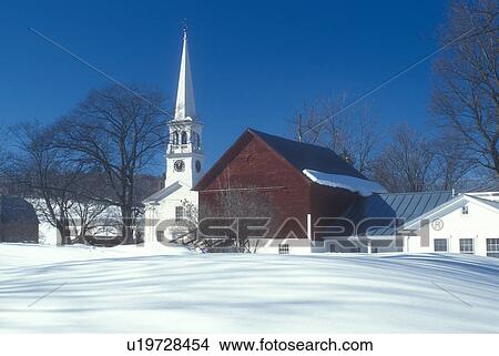 Picture -  village, Vermont, Peacham, VT, Snow-covered scenic village of Peacham with red barn and the Congregational Church. . Fotosearch