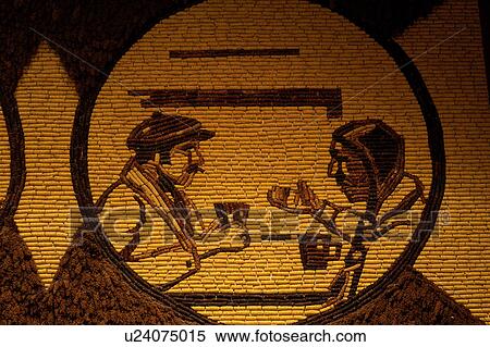 Stock Photography -  wall mural, corn palace, Mitchell, SD, South Dakota, Wall mural made of corn inside the Mitchell Corn Palace, the Millennium Corn.. Fotosearch
