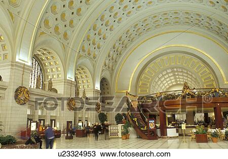 Stock Image -  Washington, DC, District of Columbia, The large hall inside Union Station is decorated for the Christmas holiday in Washington D. C.. Fotosearch