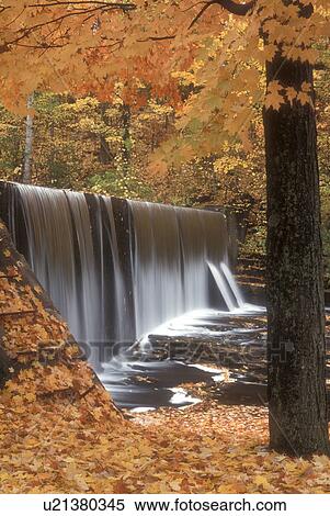 waterfall, fall, North Bennington, VT, Vermont, A sheet of water cascades over a waterfall on Paran Creek surrounded by colorful foliage in North Bennington in autumn. View Large Photo Image Stock Photography - waterfall, fall, North Bennington, VT, Vermont, A sheet of water cascades over a waterfall on Paran Creek surrounded by colorful foliage in North Bennington in autumn.. Fotosearch