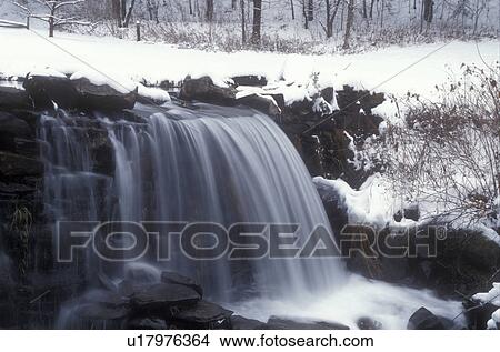 Picture -  waterfall, winter, East Calais, Vermont, VT, Waterfall on Pekin Brook in the snow in winter in East Calais.. Fotosearch