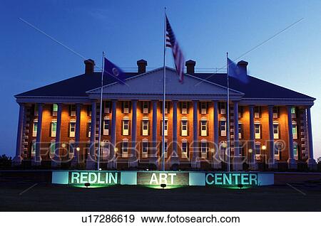 Watertown, SD, South Dakota, Redlin Art Center housed in a Colonial-style building illuminated at night. View Large Photo Image Stock Photo - Watertown, SD, South Dakota, Redlin Art Center housed in a Colonial-style building illuminated at night. . Fotosearch