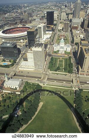 Stock Photo -  aerial, St. Louis, MO, Missouri, Aerial view of the downtown Saint Louis from the Gateway Arch. Shadow of the Gateway Arch.. Fotosearch