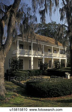 Stock Image -  Alabama, Eufaula, AL, The Tavern in Seth Lore Historic District in Eufaula in the spring.. Fotosearch