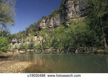 AR, Ozark Mountains, Arkansas, Buffalo National River flows through the canyon in the Ozark Mountains in Arkansas. View Large Photo Image Stock Photo - AR, Ozark Mountains, Arkansas, Buffalo National River flows through the canyon in the Ozark Mountains in Arkansas.. Fotosearch