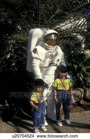 astronaut, Kennedy Space Center, FL, Florida, Spaceport USA, Astronaut posing with children for a picture at Kennedy Space Center on Merritt Island. View Large Photo Image Picture - astronaut, Kennedy Space Center, FL, Florida, Spaceport USA, Astronaut posing with children for a picture at Kennedy Space Center on Merritt Island.. Fotosearch