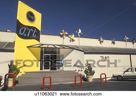 Stock Image -  Atlanta, GA, Georgia, Large pinwheels decorate the outside of TULA Art Center in Atlanta.. Fotosearch