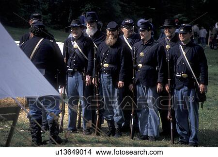 Picture -  Atlanta, Georgia, GA, Men dressed in Union Army uniforms stand in formation at the Civil War Living History Camp in Stone Mountain at the Antebellum Jubilee in Atlanta. . Fotosearch