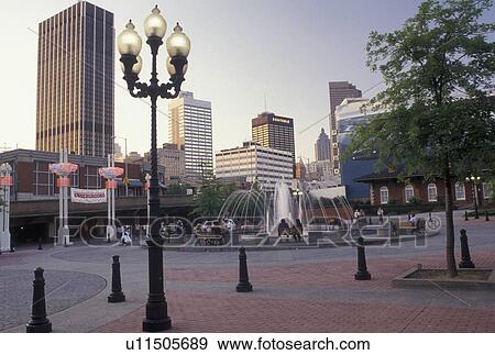 Stock Photo -  Atlanta, Underground Atlanta, skyline, GA, Georgia, Public plaza outside Underground Atlanta and a view of the downtown skyline of Atlanta. . Fotosearch