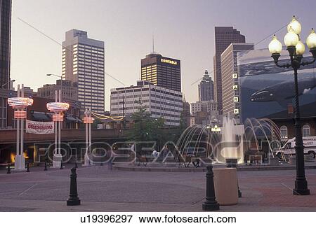Stock Photo -  Atlanta, Underground Atlanta, skyline, Georgia, GA, Public plaza outside Underground Atlanta and a view of the downtown skyline of Atlanta. . Fotosearch