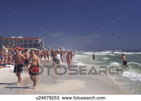 Stock Image -  beach, Spring Break, Panama City Beach, FL, Florida, Gulf of Mexico, Crowd of college students on Spring Break enjoying a day on the beach on the Gulf of Mexico.. Fotosearch