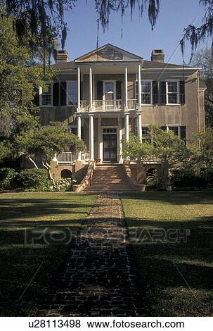 Stock Photo -  Beaufort, mansion, South Carolina, antebellum, SC, The Thomas Fuller House (Tabby Manse) in the Historic District in the town of Beaufort in the spring.. Fotosearch