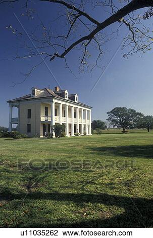 Stock Image -  Beauregard House, New Orleans, LA, Jean Lafitte National Historical Park, Louisiana, The Malus-Beauregard House on the grounds of the Chalmette Battlefield and National Cemetery at Jean Lafitte Nat'l Historical Park and Preserve in Louisiana.. Fotosearch