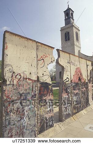 Stock Photo -  berlin wall, Fulton, MO, Missouri, Part of the Berlin Wall outside the Church of St. Mary the Virgin, Aldermanbury, on the grounds of the Winston Churchill Memorial and Library on the campus of Westminster College in Fulton.. Fotosearch