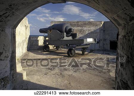 Stock Image -  Bermuda, fort, St. George's Parish, Cannon on the ramparts of Fort St. Catherine overlooking the Atlantic Ocean in St George in Bermuda.. Fotosearch