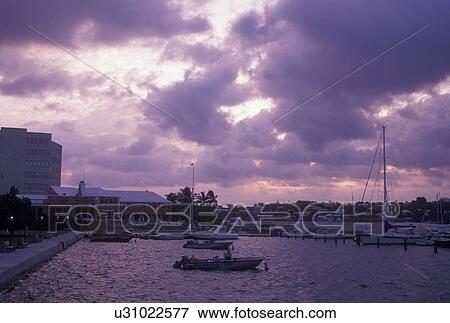Stock Photo -  Bermuda, Hamilton, Boats at sunset at Royal Bermuda Yacht Club on Hamilton Harbor in Bermuda., . Fotosearch