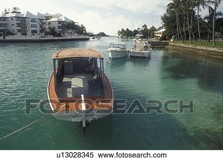 Bermuda, Smith's Parish, Boat buoyed at the marina in Flatt's Inlet in Smith's Parish in Flatts in Bermuda., View Large Photo Image Stock Photography - Bermuda, Smith's Parish, Boat buoyed at the marina in Flatt's Inlet in Smith's Parish in Flatts in Bermuda., . Fotosearch