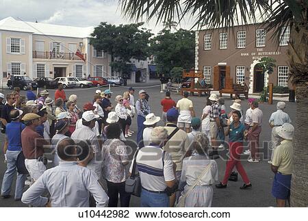 Stock Image -  Bermuda, St. George's Parish, Interpretive talk of historical St George in King's Square in St George in Bermuda., . Fotosearch