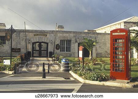 Bermuda, The West End, Sandy's Parish, Red telephone booth outside The Cooperage at the Royal Naval Dockyard at the end of Ireland Island in Sandy's Parish in Bermuda. View Large Photo Image Stock Image - Bermuda, The West End, Sandy's Parish, Red telephone booth outside The Cooperage at the Royal Naval Dockyard at the end of Ireland Island in Sandy's Parish in Bermuda. . Fotosearch