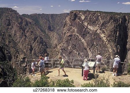 Black Canyon of the Gunnison National Park, CO, Colorado, South Rim, People at the overlook at Cedar Point in the Black Canyon of the Gunnison Nat'l Park in Colorado. View Large Photo Image Stock Photo - Black Canyon of the Gunnison National Park, CO, Colorado, South Rim, People at the overlook at Cedar Point in the Black Canyon of the Gunnison Nat'l Park in Colorado.. Fotosearch