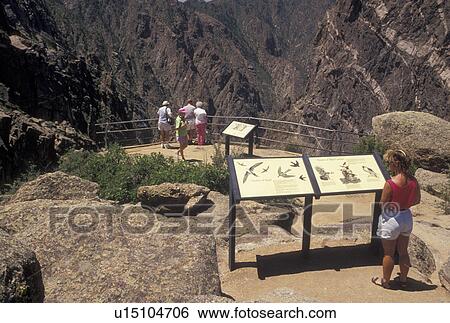 Black Canyon of the Gunnison National Park, CO, Colorado, South Rim, People at the overlook at Cedar Point in the Black Canyon of the Gunnison Nat'l Park in Colorado. View Large Photo Image Stock Photograph - Black Canyon of the Gunnison National Park, CO, Colorado, South Rim, People at the overlook at Cedar Point in the Black Canyon of the Gunnison Nat'l Park in Colorado.. Fotosearch