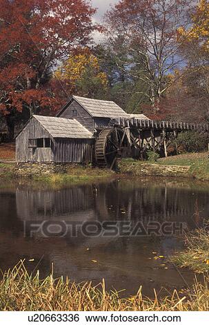 Stock Photograph -  Blue Ridge, grist mill, VA, Virginia, Scenic view of Mabry Mill surrounded by colorful fall foliage along the Blue Ridge Parkway in autumn in Virginia.. Fotosearch