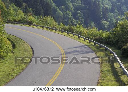 Stock Image -  Blue Ridge Parkway, NC, North Carolina, The Blue Ridge Parkway is a scenic drive winding through the mountains in North Carolina.. Fotosearch