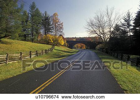 Blue Ridge, VA, road, bridge, VA, Virginia, Scenic Blue Ridge Parkway passes under a stone bridge in autumn in Virginia. View Large Photo Image Picture - Blue Ridge, VA, road, bridge, VA, Virginia, Scenic Blue Ridge Parkway passes under a stone bridge in autumn in Virginia.. Fotosearch