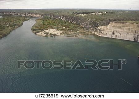 Stock Photo -  border, Del Rio, TX, Texas/Mexico, Amistad National Recreation Area, Del Rio River from Amistad Dam on the US/Mexican Border.. Fotosearch