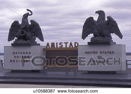 border, eagle, Del Rio, TX, Texas/Mexico, Amistad National Recreation Area, United States and Mexican Eagles at the Center of Amistad Dam View Large Photo Image Stock Photo - border, eagle, Del Rio, TX, Texas/Mexico, Amistad National Recreation Area, United States and Mexican Eagles at the Center of Amistad Dam. Fotosearch