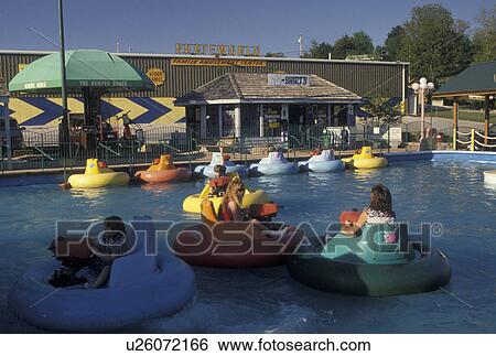 Stock Photograph -  Branson, MO, Missouri, 76 Country Boulevard, The Strip, Bumper Boats an outdoor activity in Branson.. Fotosearch