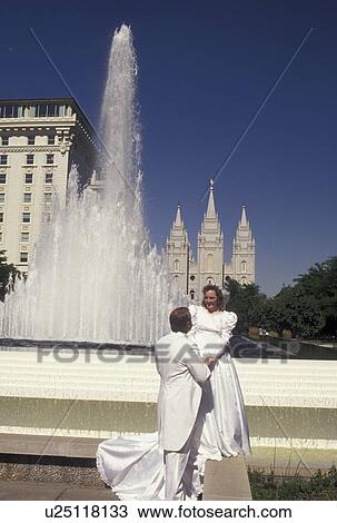 bride and groom, mormons, Salt Lake City, UT, Utah, Mormon bride and groom at the fountain in front of the Mormon Temple in Salt Lake City. The Church of Jesus Christ of Latter-day Saints. View Large Photo Image Stock Image - bride and groom, mormons, Salt Lake City, UT, Utah, Mormon bride and groom at the fountain in front of the Mormon Temple in Salt Lake City. The Church of Jesus Christ of Latter-day Saints.. Fotosearch