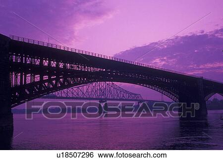 bridge, St. Louis, MO, Missouri, Martin Luther King Junior Memorial Bridge crossing the Mississippi River in Saint Louis at sunrise. View Large Photo Image Stock Photograph - bridge, St. Louis, MO, Missouri, Martin Luther King Junior Memorial Bridge crossing the Mississippi River in Saint Louis at sunrise. . Fotosearch