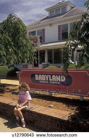 Cabbage Patch Kids, babyland, Cleveland, GA, Georgia, Nine year old girl sits out in front of Babyland General Hospital, Home of the Cabbage Patch Kids in Cleveland in North Georgia. View Large Photo Image Stock Image - Cabbage Patch Kids, babyland, Cleveland, GA, Georgia, Nine year old girl sits out in front of Babyland General Hospital, Home of the Cabbage Patch Kids in Cleveland in North Georgia.. Fotosearch