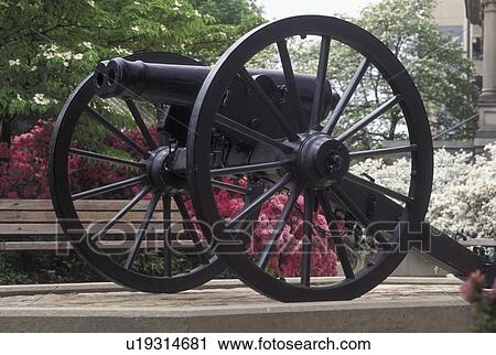 Stock Image -  cannon, Athens, GA, Georgia, Double barrelled cannon outside City Hall in Athens in the spring.. Fotosearch