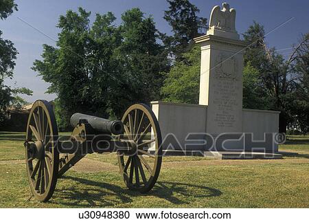 Stock Image -  cannon, Tupelo, MS, Mississippi, A cannon and granite monument commemorate the Battle of Tupelo at the Tupelo National Battlefield in Tupelo. . Fotosearch