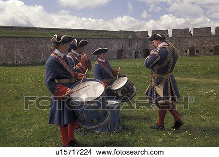 Picture -  Cape Breton, Nova Scotia, NS, Canada, Atlantic Ocean, Fife and drum corp play at King's Bastion at the Fortress of Louisbourg National Historic Site on Cape Breton Island in Nova Scotia. . Fotosearch