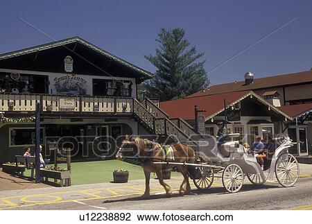 carriage ride, Alpine Village, Helen, GA, Georgia, Horse-drawn carriage carries visitors through the alpine village of Helen in North Georgia. View Large Photo Image Stock Image - carriage ride, Alpine Village, Helen, GA, Georgia, Horse-drawn carriage carries visitors through the alpine village of Helen in North Georgia.. Fotosearch