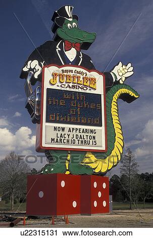 casino, Mississippi, MS, Bay St. Louis, Huge alligator sign at the entrance to Bayou Caddy Casino in Bay St. Louis. View Large Photo Image Stock Image - casino, Mississippi, MS, Bay St. Louis, Huge alligator sign at the entrance to Bayou Caddy Casino in Bay St. Louis. . Fotosearch