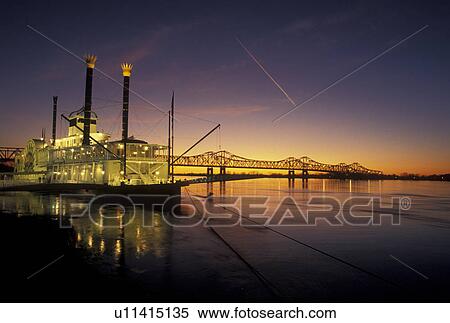Stock Photography -  casino, sunset, Natchez, Mississippi River, riverboat, MS, Mississippi, Lady Luck Natchez Riverboat Casino on the Mississippi River at sunset in Natchez. . Fotosearch