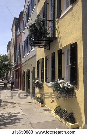 Stock Image -  Charleston, South Carolina, SC, Rainbow Row, a collection of colorful historical houses, along East Bay Street in Charleston in the spring.. Fotosearch