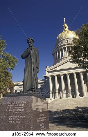 Picture -  Charleston, WV, State Capitol, State House, Lincoln, West Virginia, Statue of Abraham Lincoln outside the West Virginia State Capitol Building in the capital city of Charleston in autumn.. Fotosearch