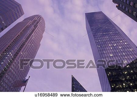 Stock Photo -  Charlotte, NC, North Carolina, High rise buildings in downtown Charlotte in the evening.. Fotosearch